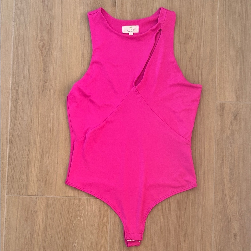Sleeveless Bodysuit with slit detail in Bright Pink